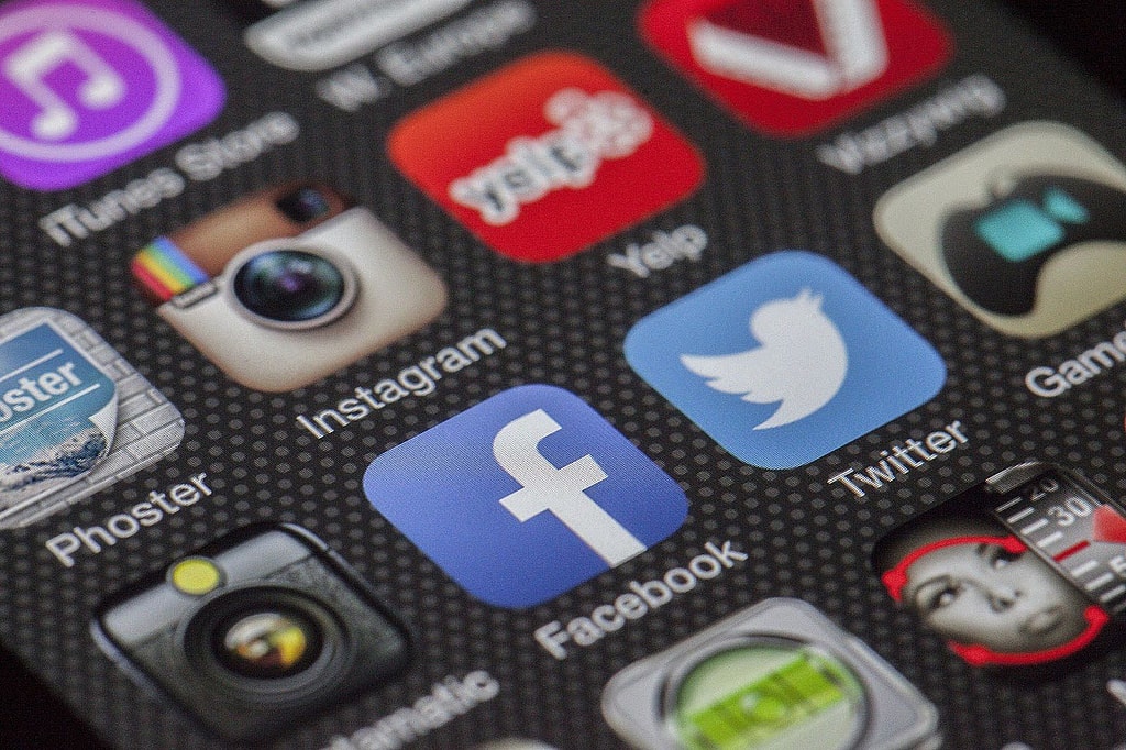 Old iPhone screen with social community apps