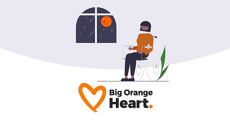 Person sitting looking out a window