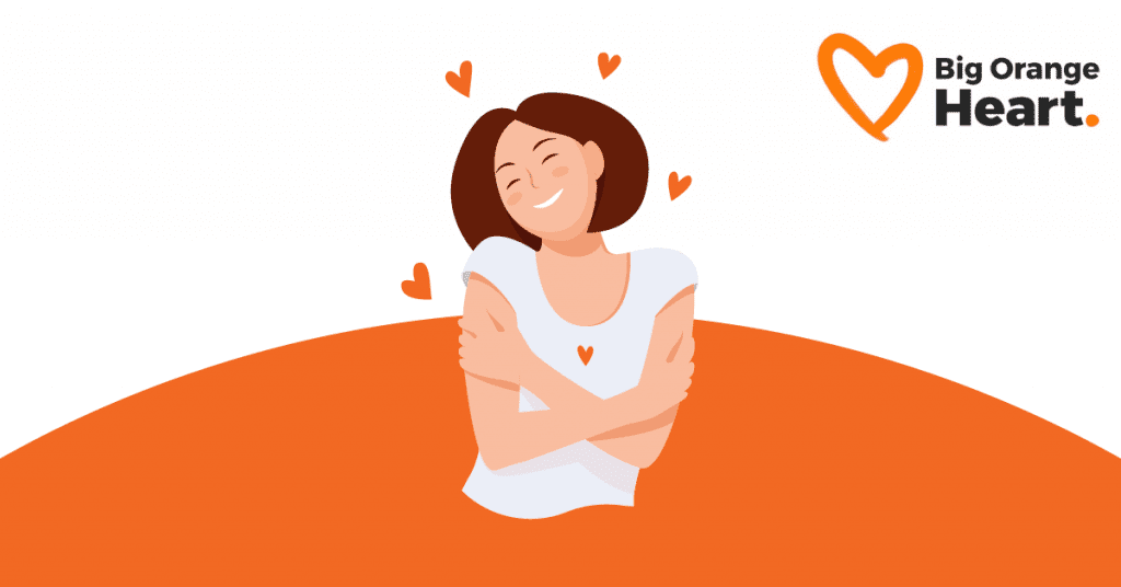 Woman hugging herself with hearts around her