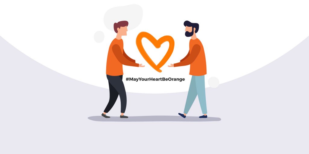 Two illustrated men holding an orange heart with the hashtag #MayYourHeartBeOrange between them