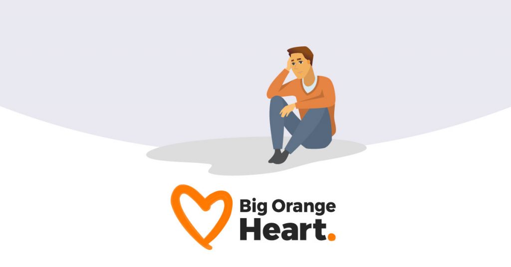 An illustrated person sitting alone looking unhappy