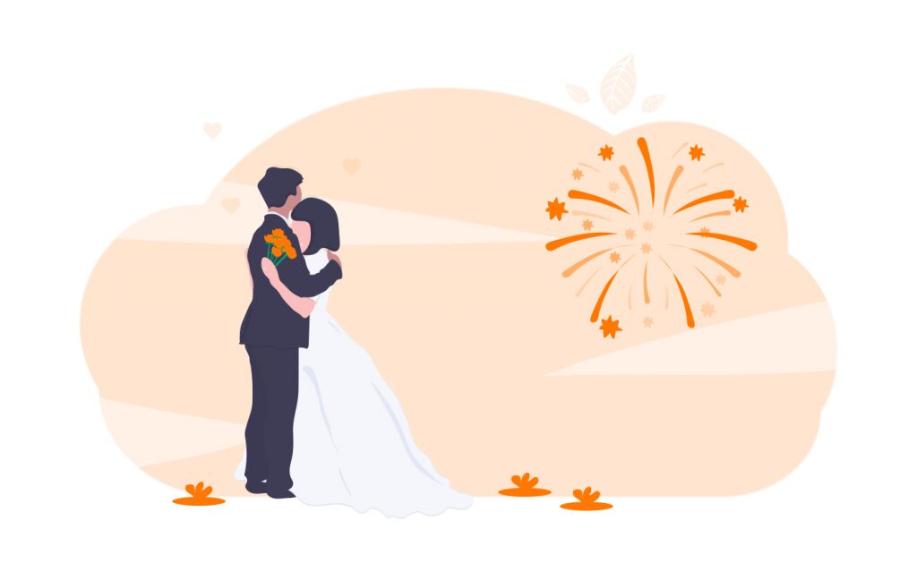 bride and groom in front of fireworks